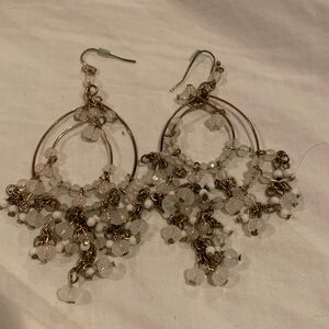 GUC dangly earrings in gold and white